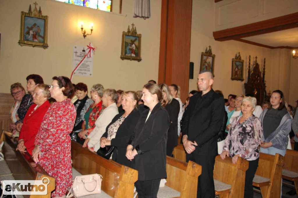 Tablica upamiętniająca ks. Jana Dzikowskiego